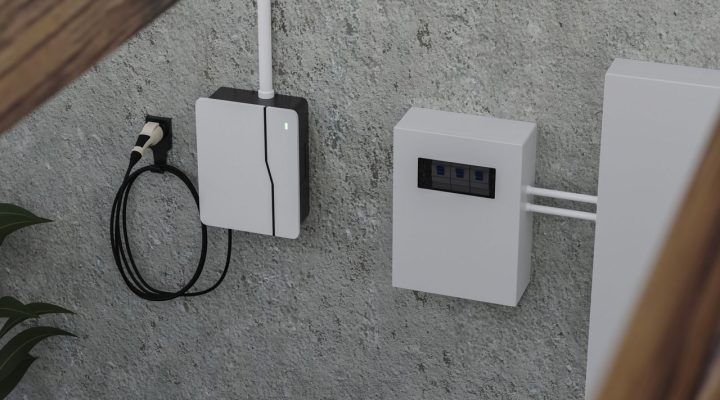A compact and modern electric vehicle charger mounted on a wall, designed for convenient charging of electric vehicles.